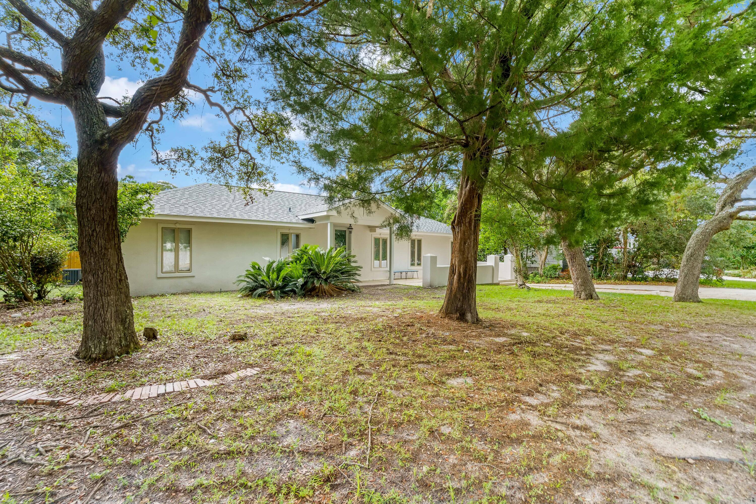 a house with trees in front of it