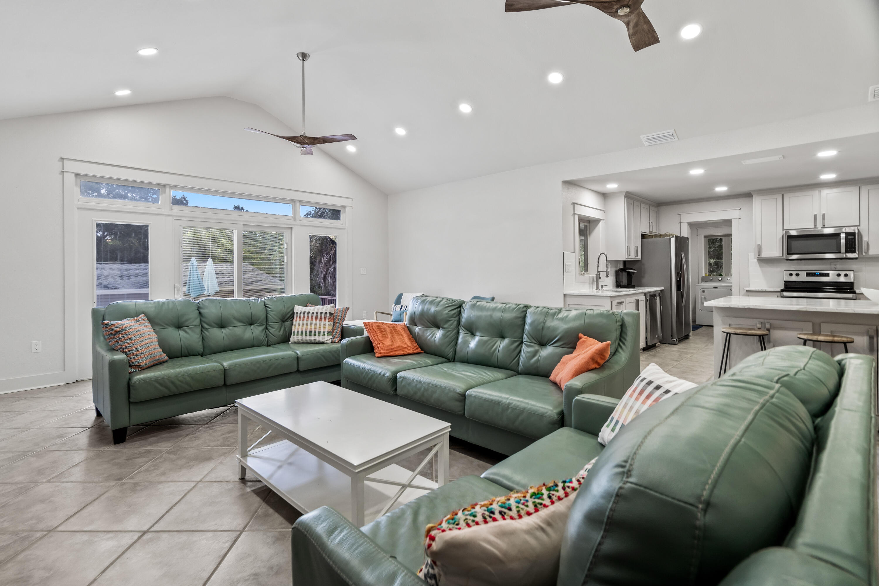 200 Beach Drive West Miramar Beach, FL 32550 - Photo 16 of 45 a living room with furniture and a chandelier