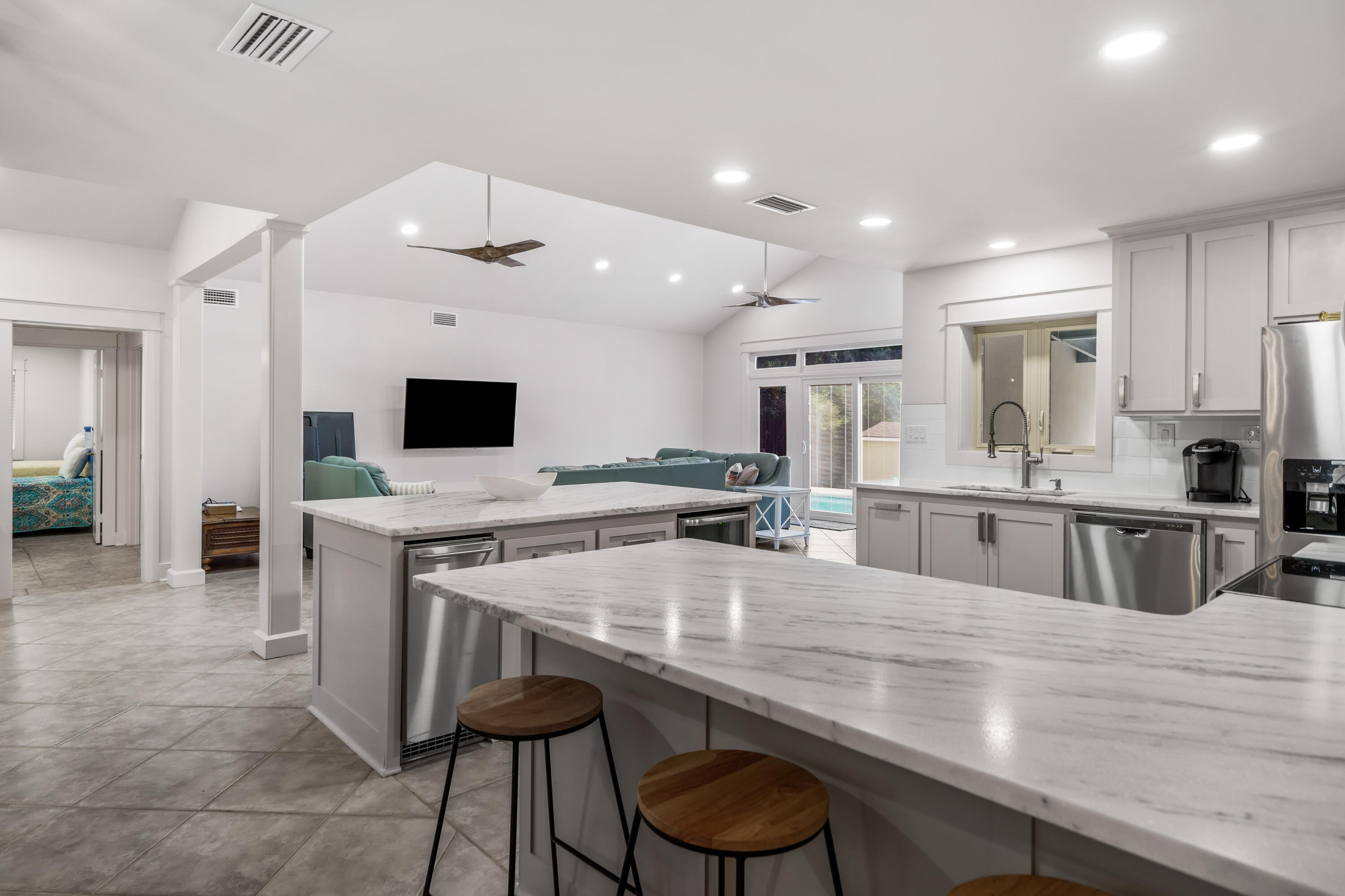 200 Beach Drive West Miramar Beach, FL 32550 - Photo 18 of 45 a large kitchen with a table and chairs