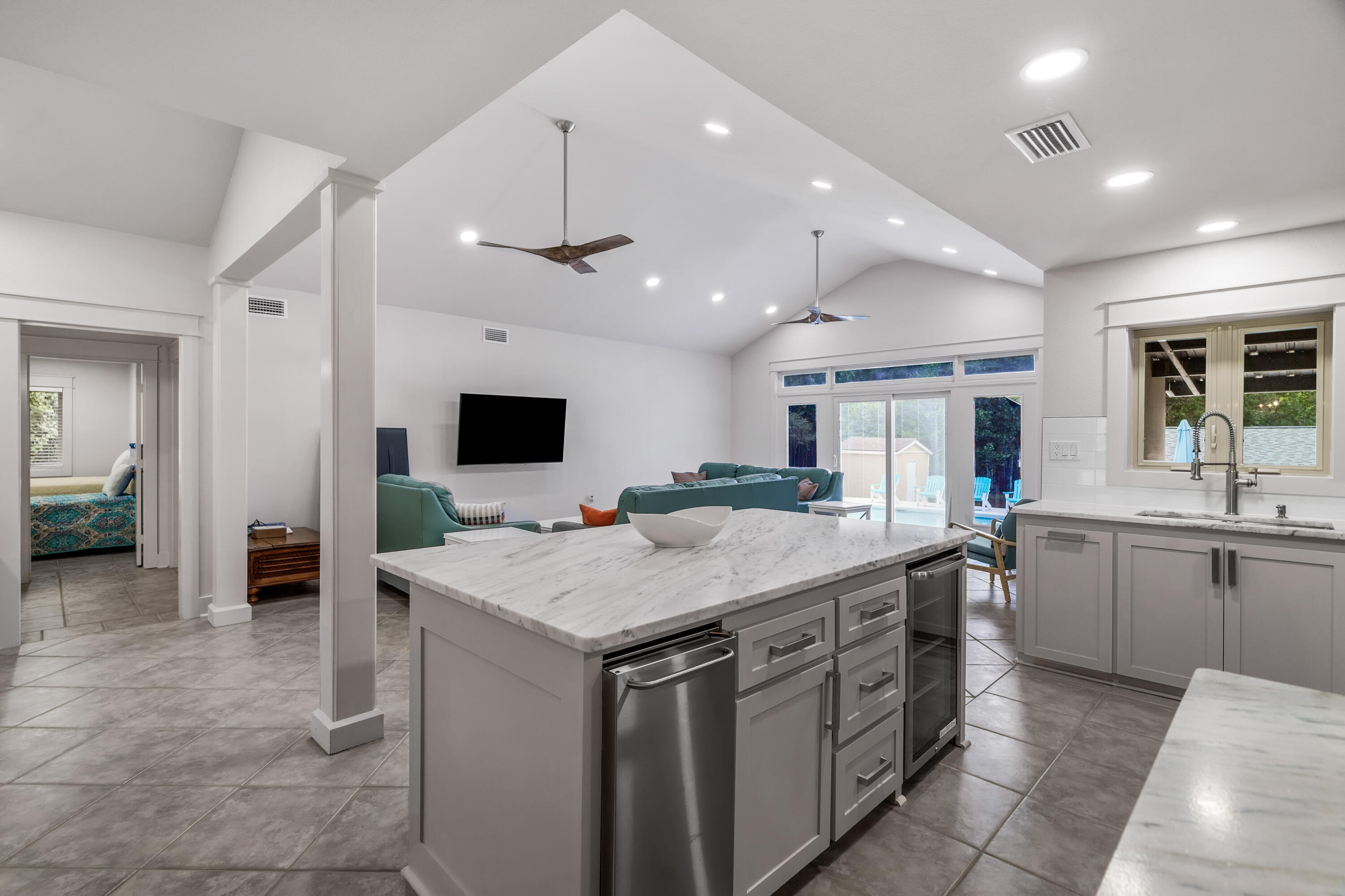 200 Beach Drive West Miramar Beach, FL 32550 - Photo 19 of 45 a kitchen with a stove a counter top space and a sink