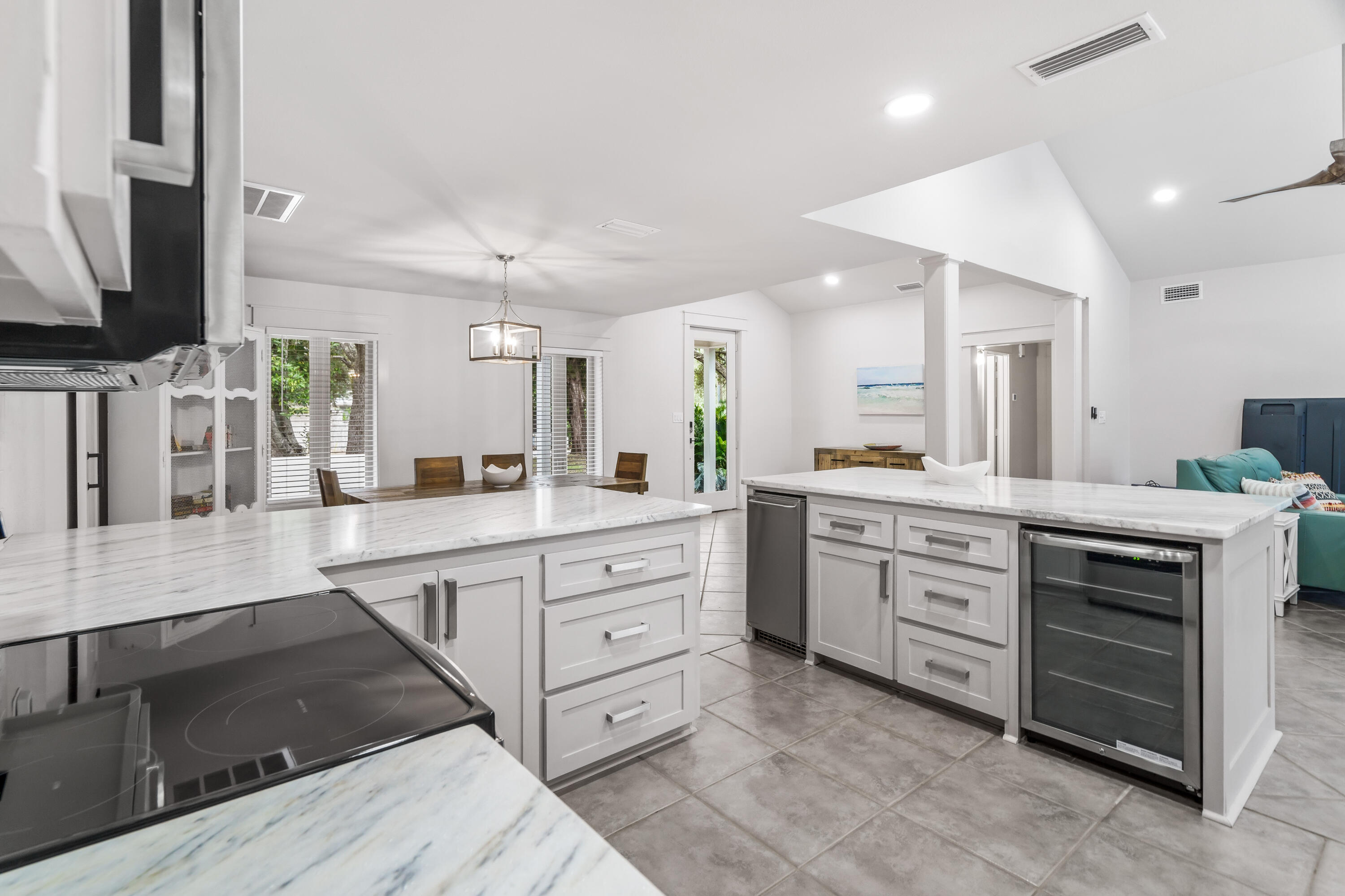 200 Beach Drive West Miramar Beach, FL 32550 - Photo 22 of 45 a large bathroom with a large mirror vanity and a sink