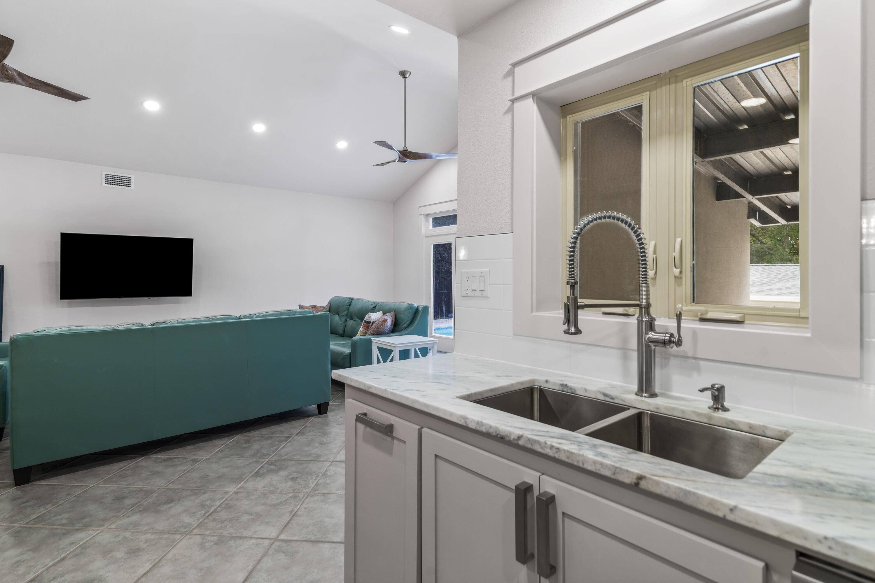 200 Beach Drive West Miramar Beach, FL 32550 - Photo 23 of 45 a kitchen with a sink and a microwave