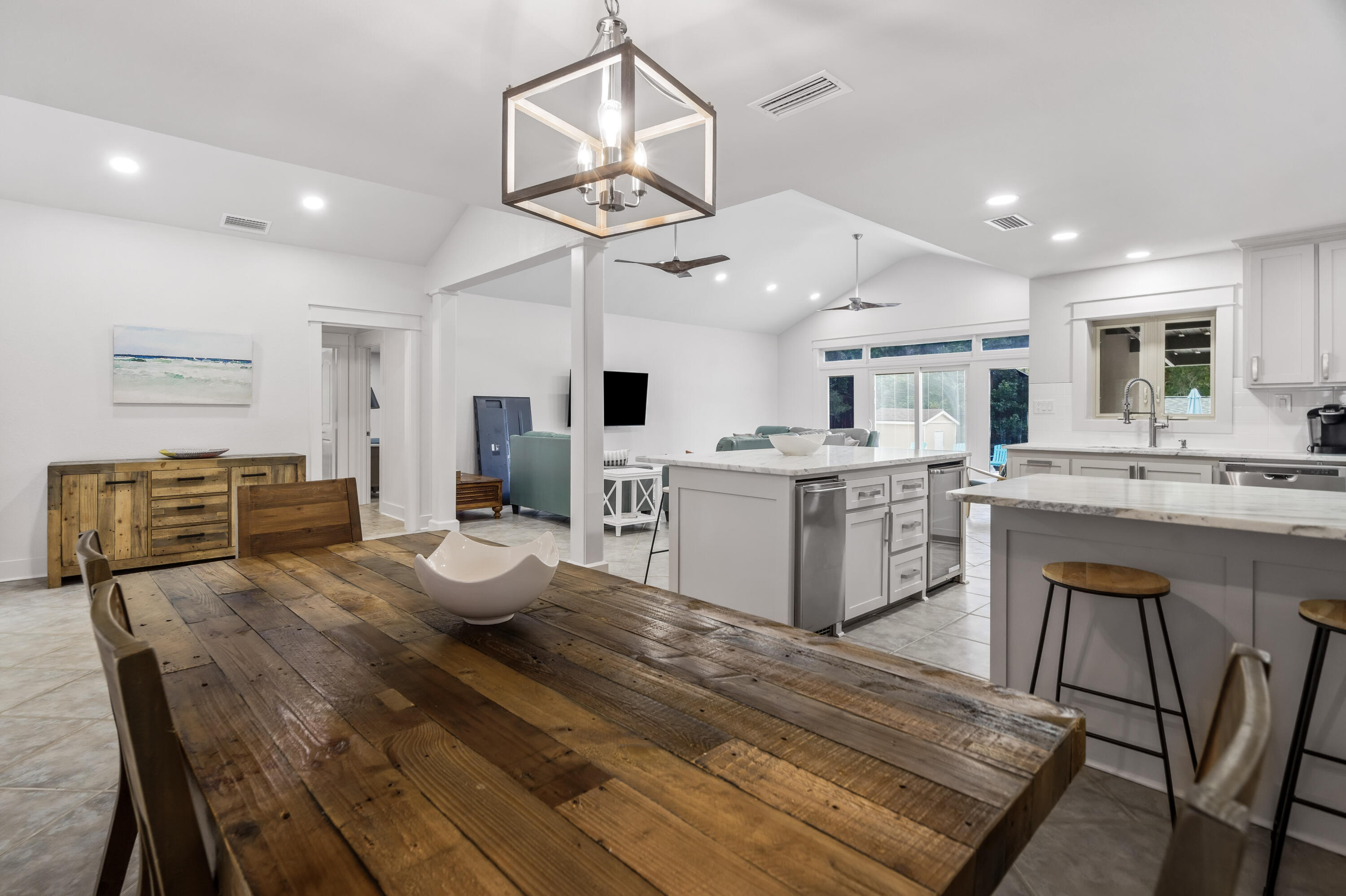 200 Beach Drive West Miramar Beach, FL 32550 - Photo 27 of 45 a large kitchen with cabinets wooden floor and stainless steel appliances