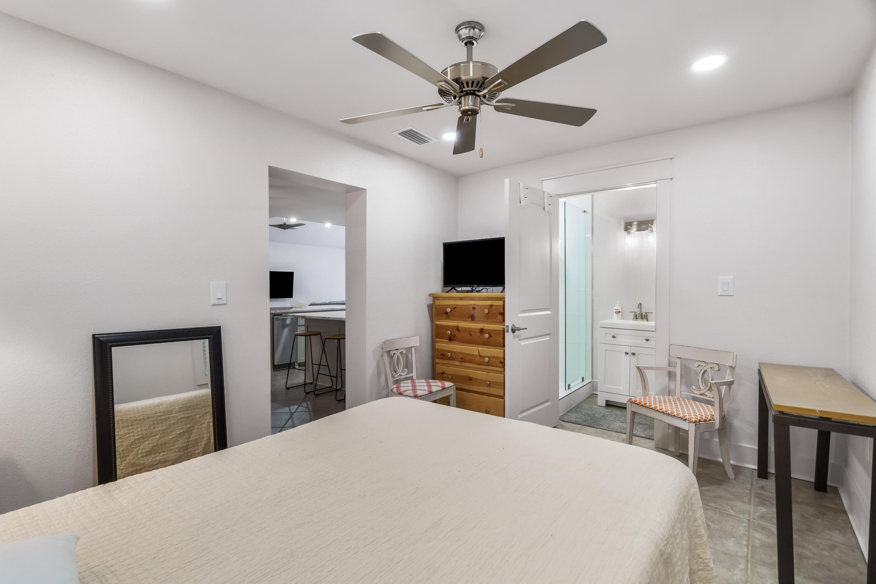 200 Beach Drive West Miramar Beach, FL 32550 - Photo 29 of 45 a bedroom with a bed and a flat screen tv