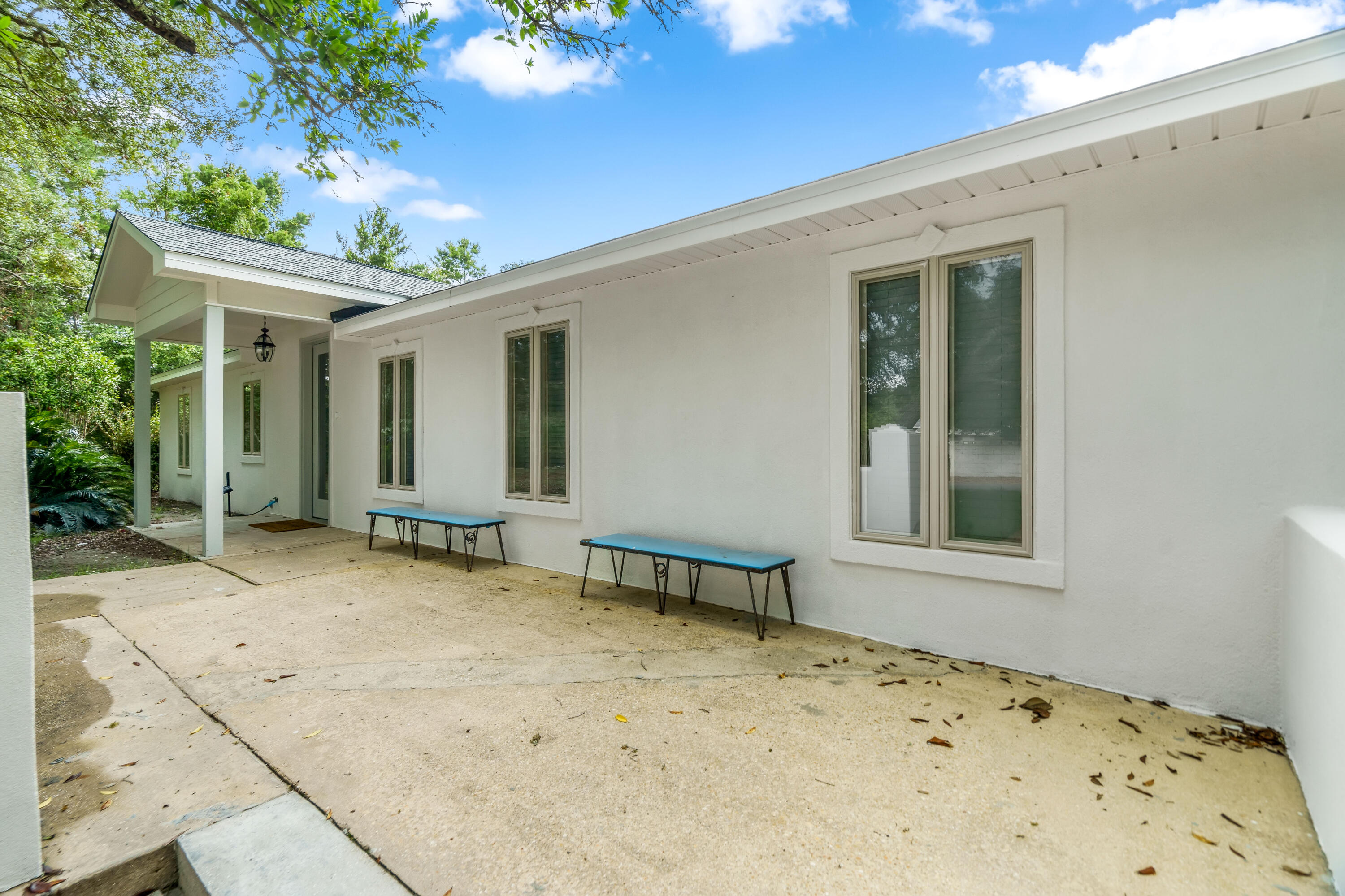 200 Beach Drive West Miramar Beach, FL 32550 - Photo 3 of 45 a view of a house with a backyard