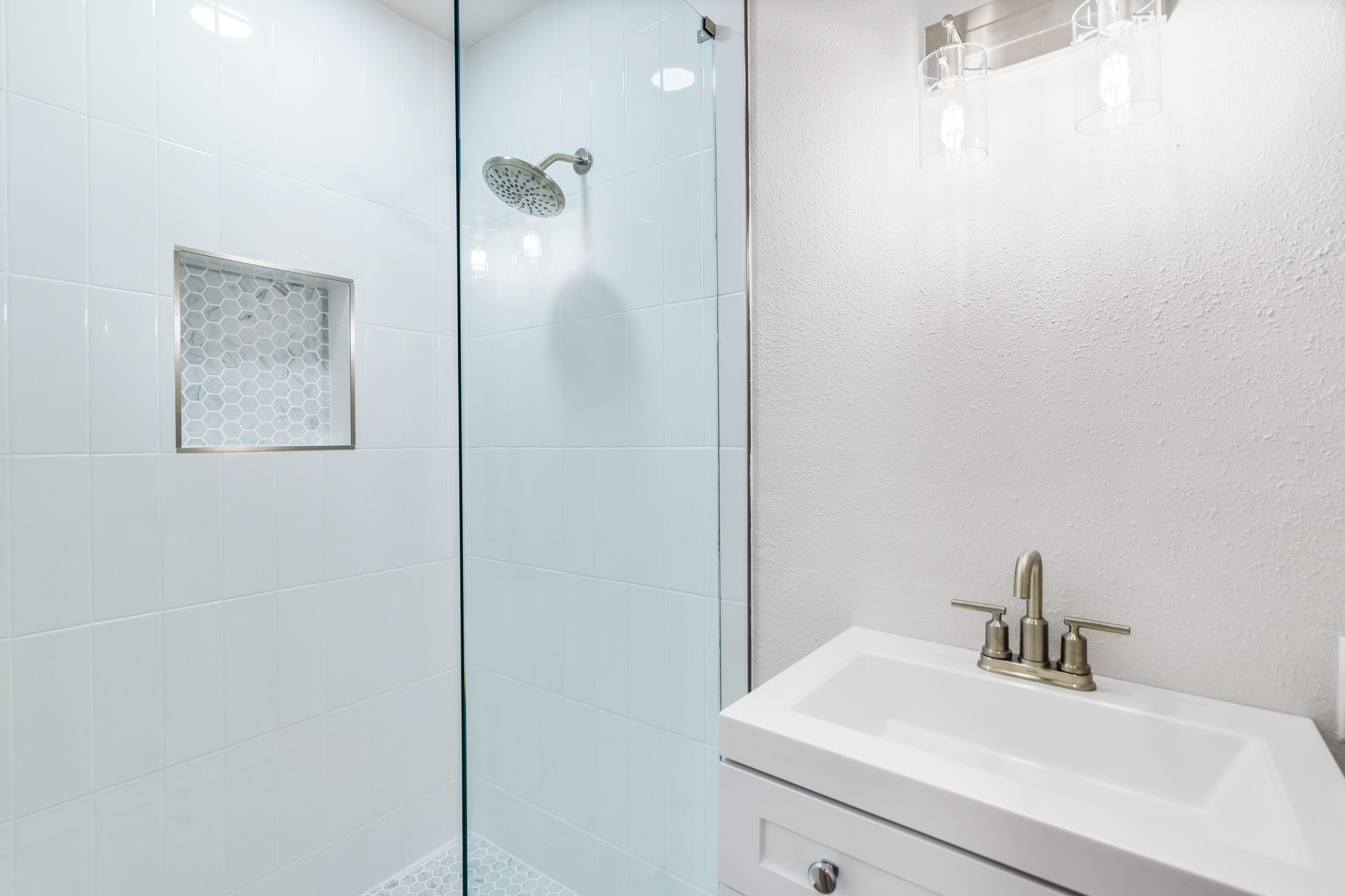 200 Beach Drive West Miramar Beach, FL 32550 - Photo 31 of 45 a bathroom with a sink and a mirror
