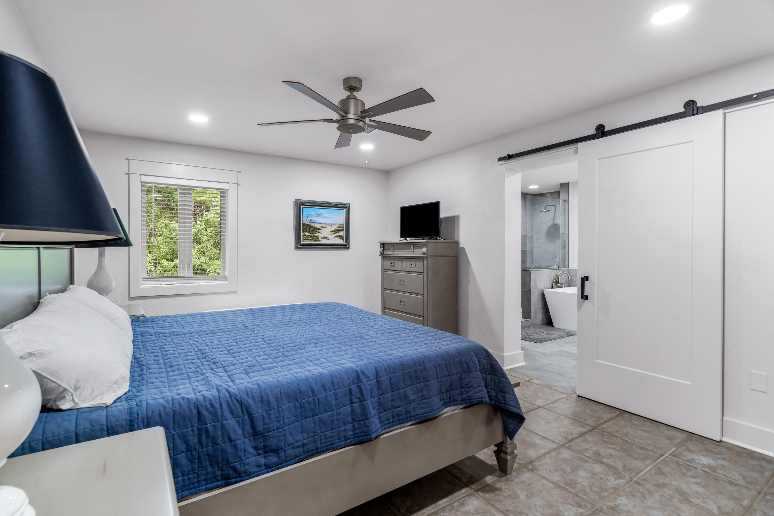 200 Beach Drive West Miramar Beach, FL 32550 - Photo 38 of 45 a bedroom with a large bed and a window