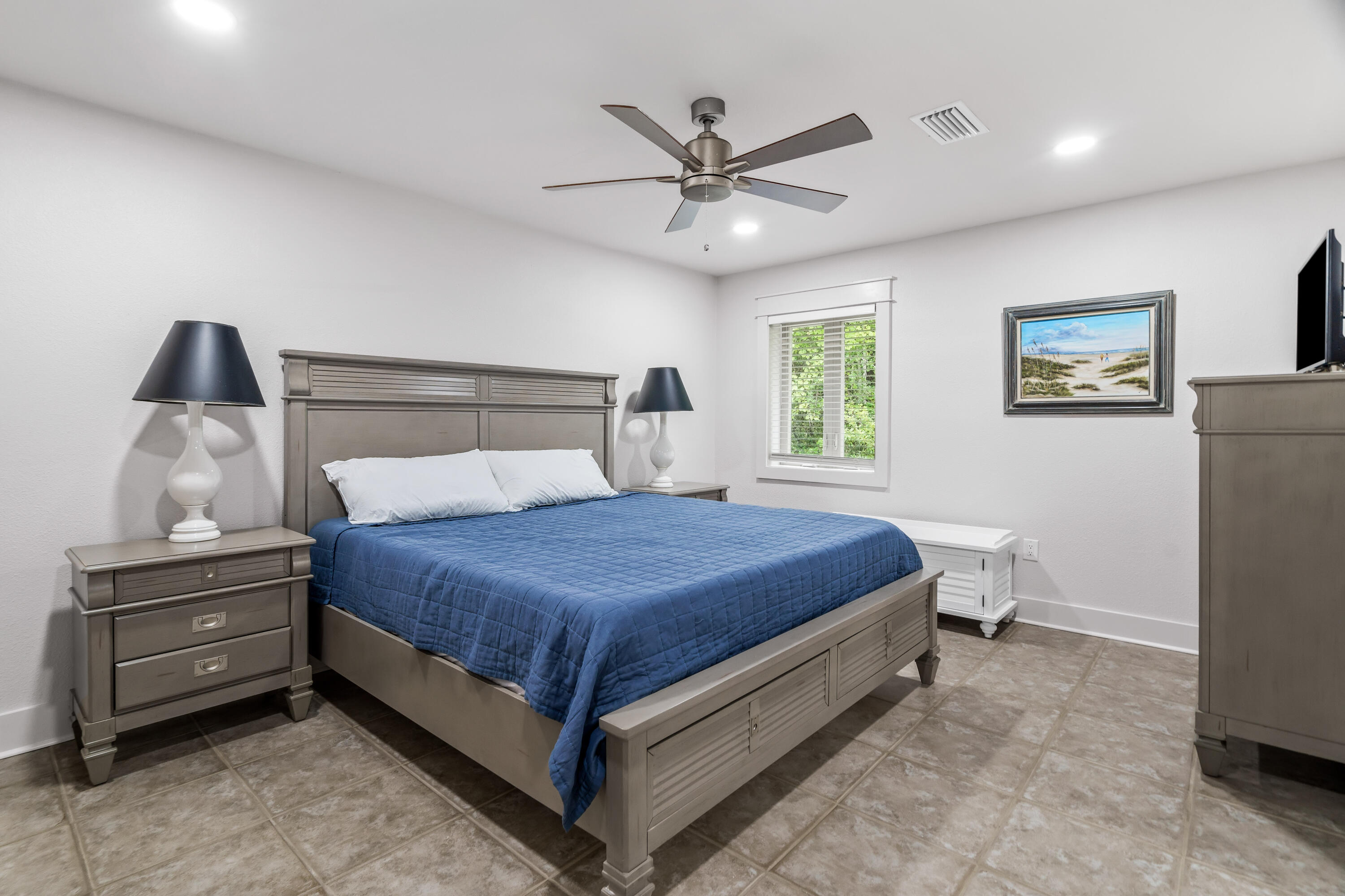 200 Beach Drive West Miramar Beach, FL 32550 - Photo 39 of 45 a bedroom with a bed and a chandelier