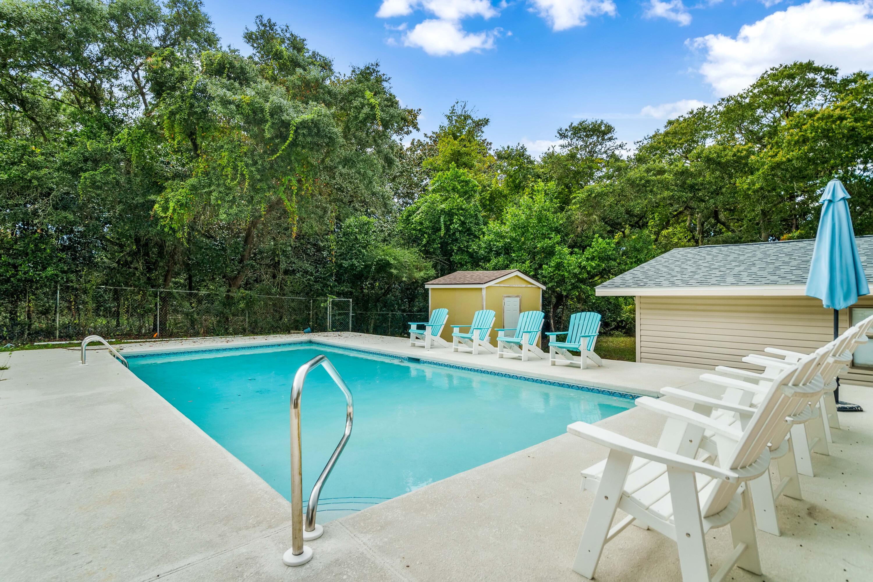 200 Beach Drive West Miramar Beach, FL 32550 - Photo 4 of 45 a view of a swimming pool with a patio