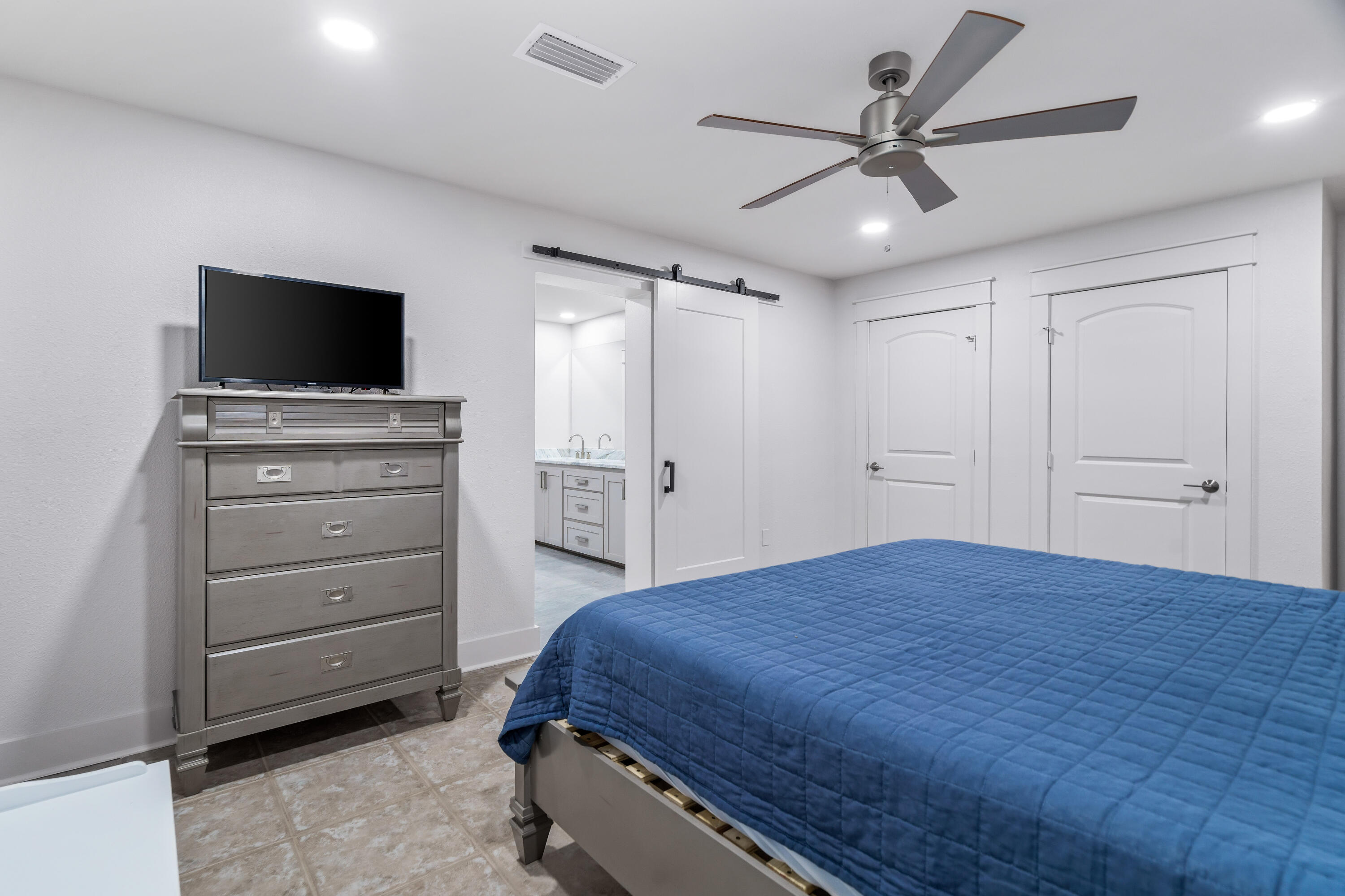 200 Beach Drive West Miramar Beach, FL 32550 - Photo 41 of 45 a bedroom with a bed and a television