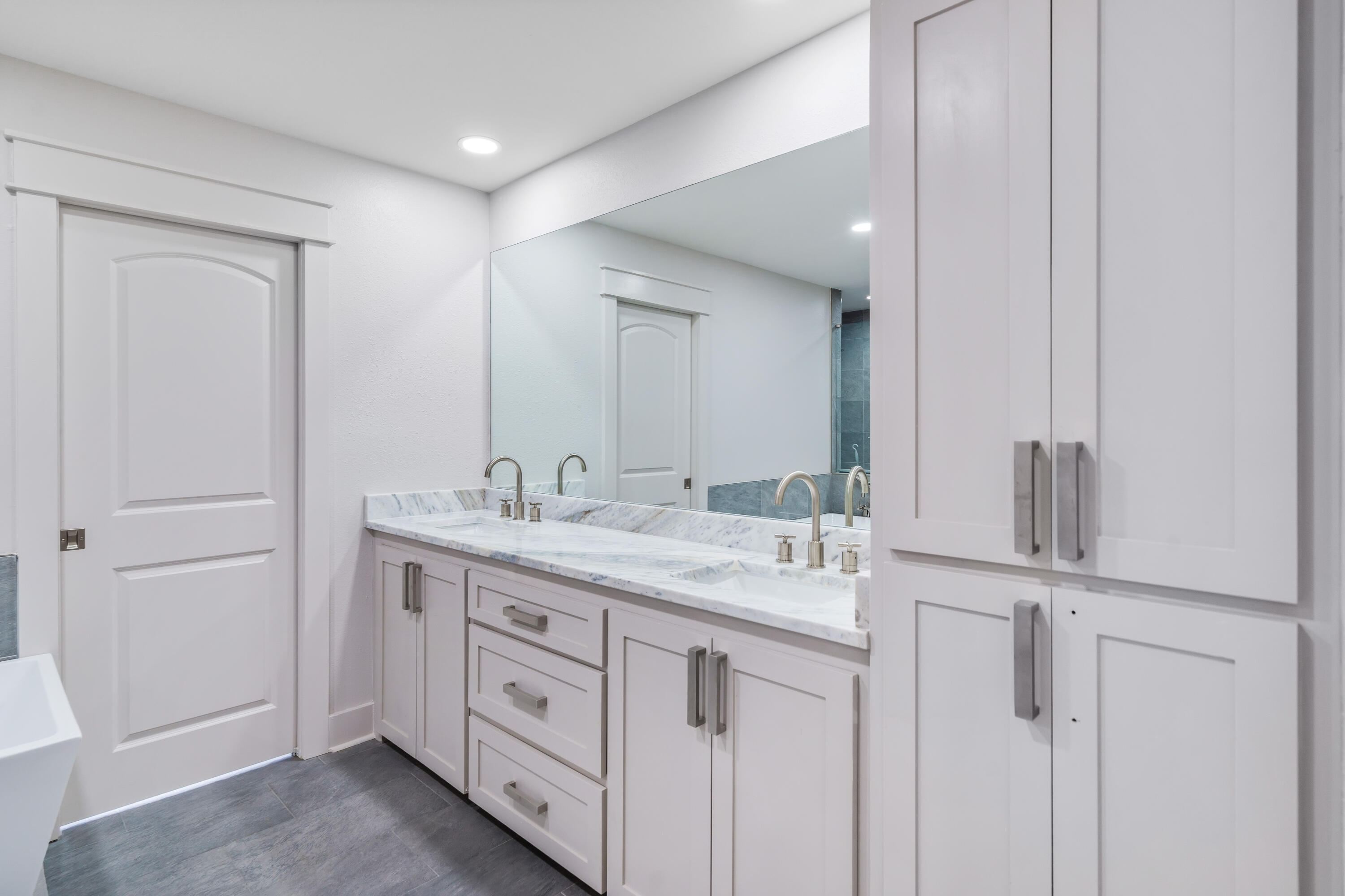 200 Beach Drive West Miramar Beach, FL 32550 - Photo 42 of 45 a bathroom with a granite countertop sink and a mirror