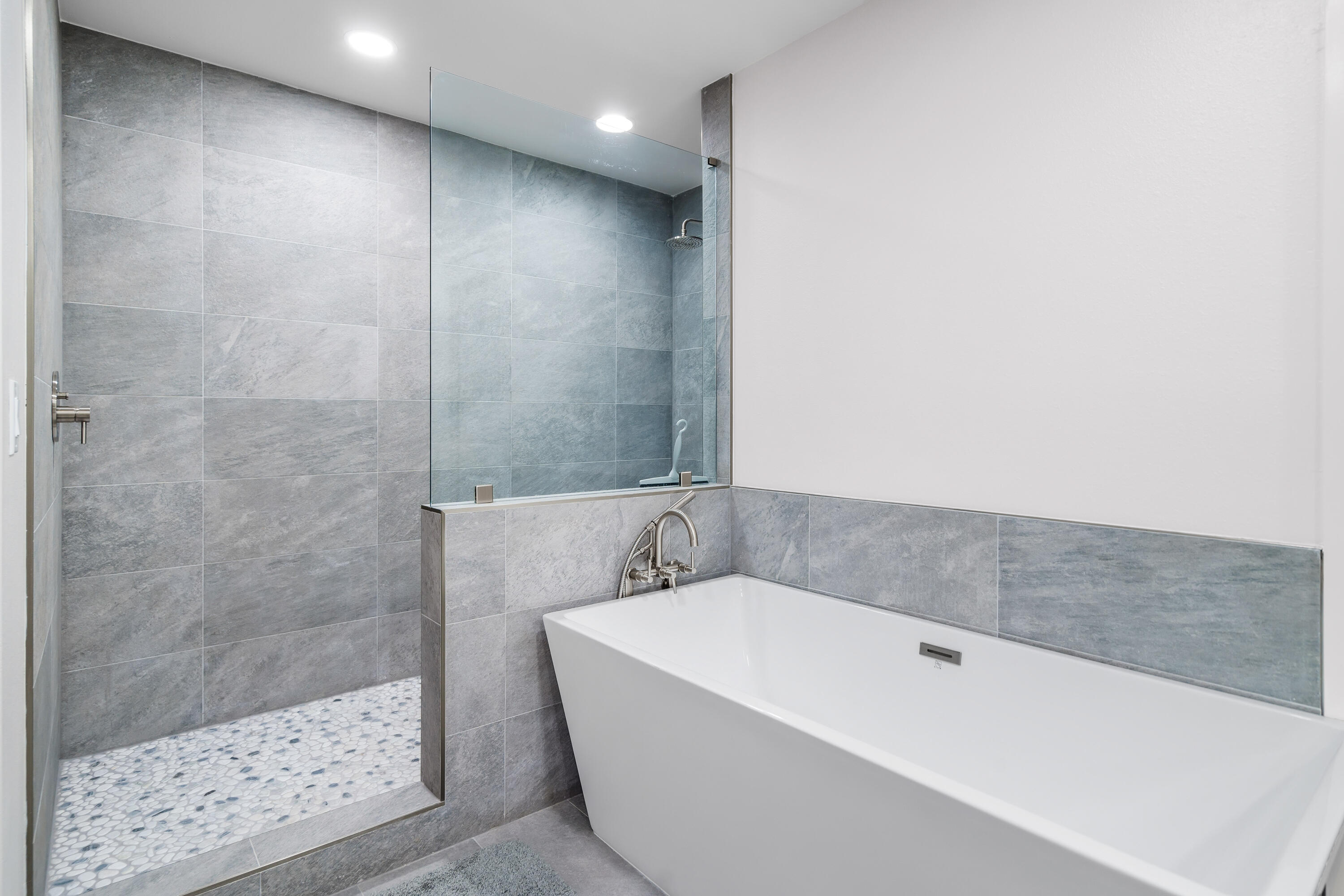 200 Beach Drive West Miramar Beach, FL 32550 - Photo 43 of 45 a bathroom with a bathtub and a shower