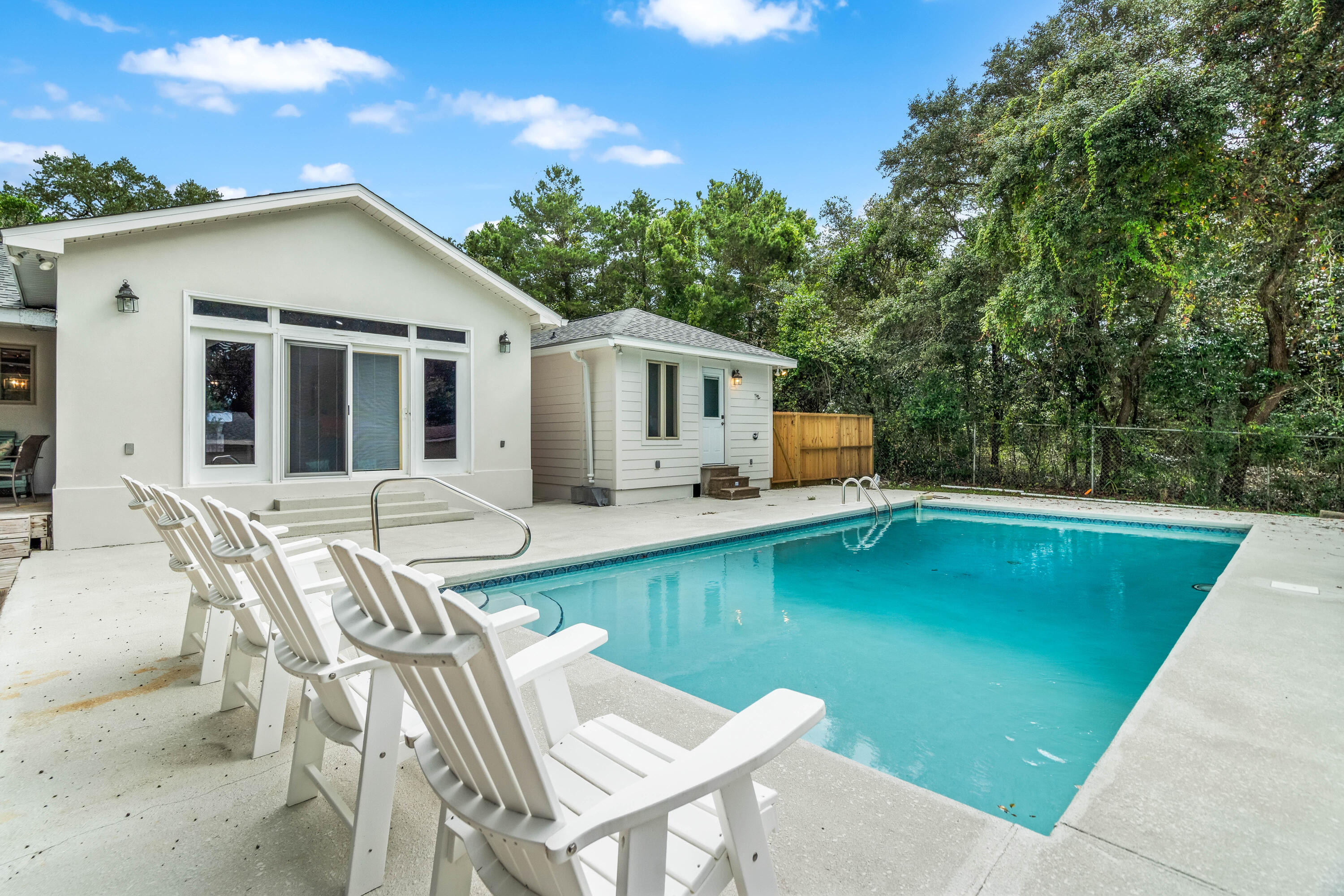 200 Beach Drive West Miramar Beach, FL 32550 - Photo 5 of 45 a view of a house with pool table and chairs
