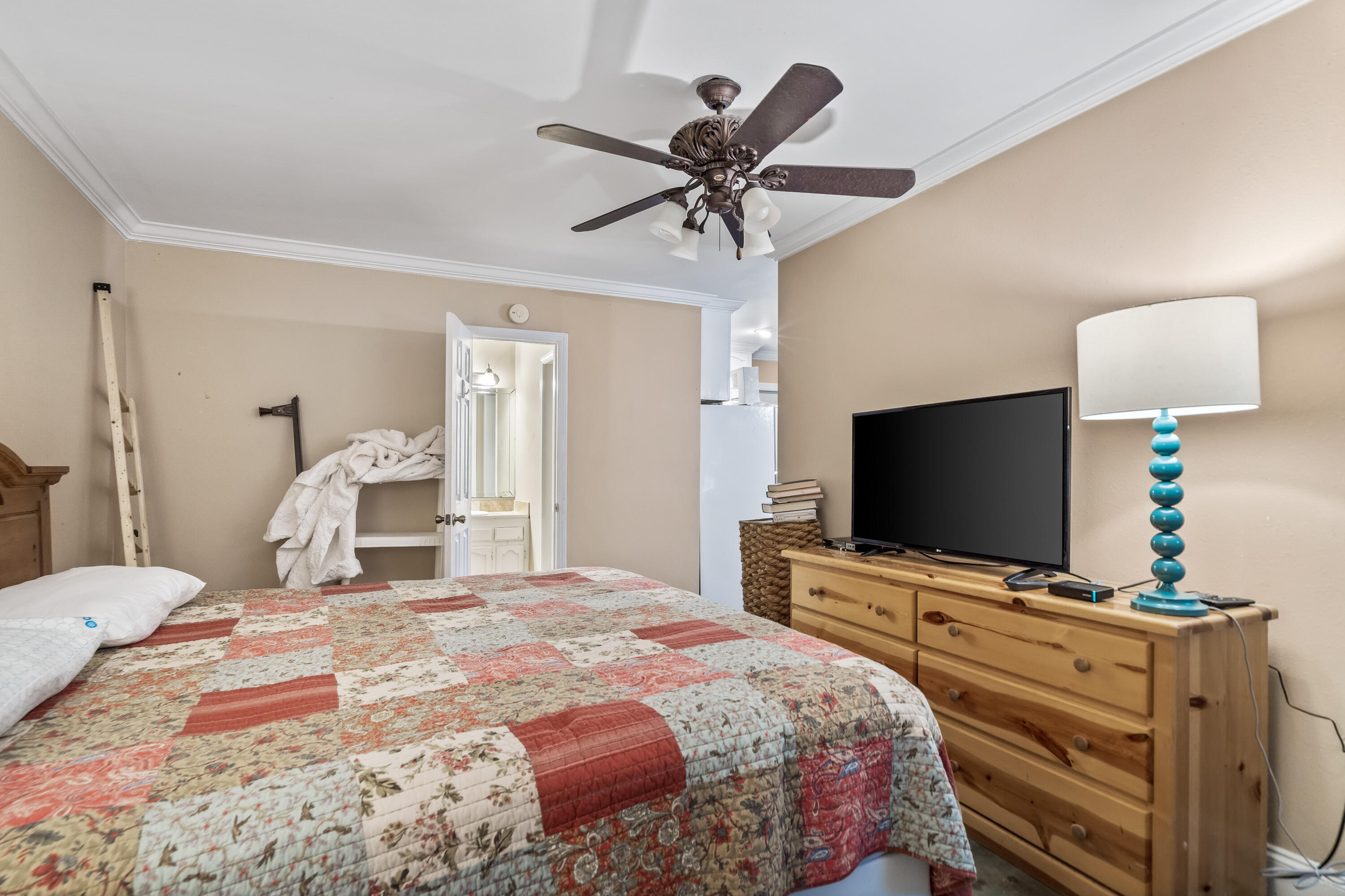 200 Beach Drive West Miramar Beach, FL 32550 - Photo 10 of 45 a bedroom with a bed and a flat screen tv