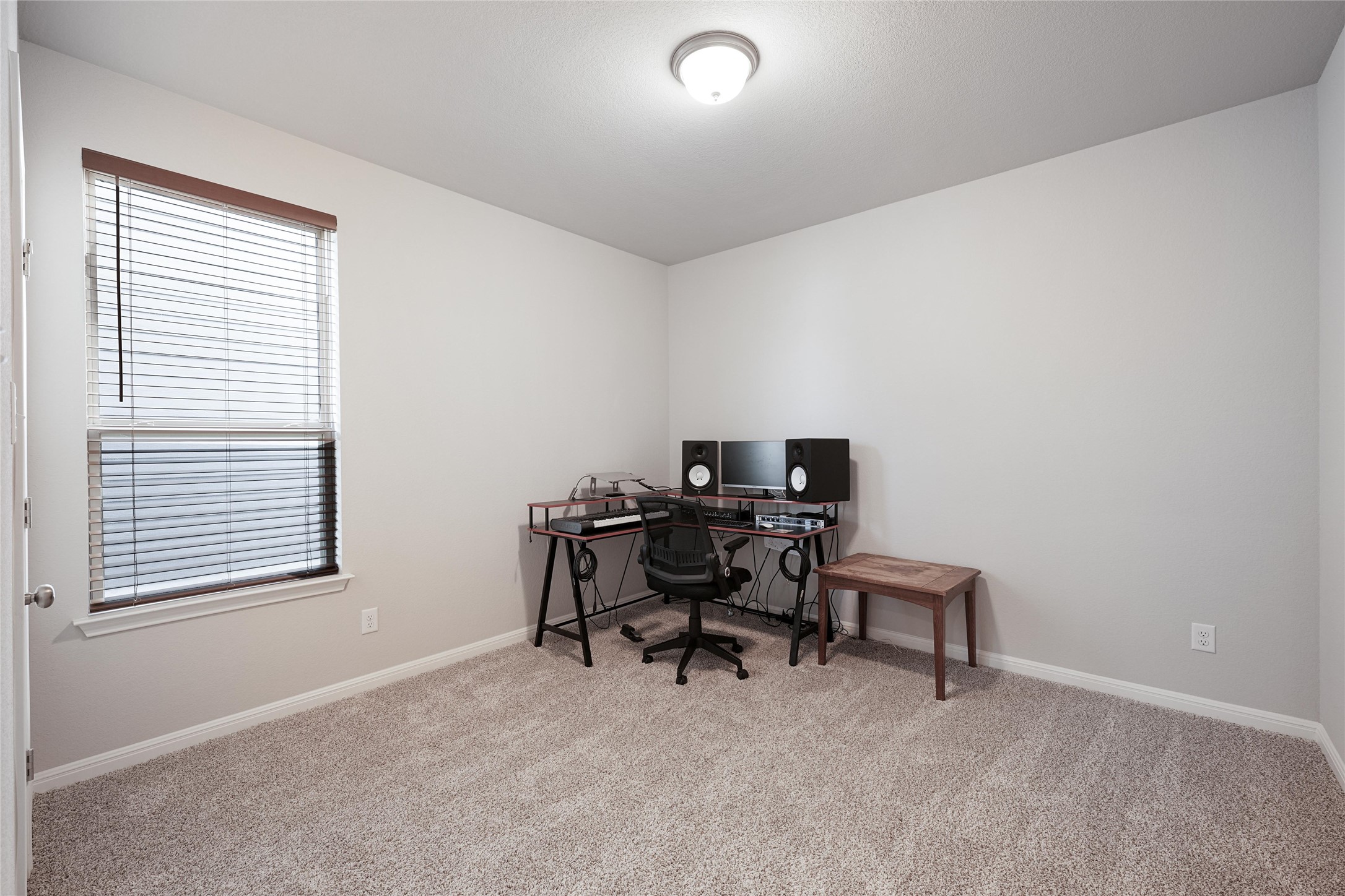 108 Drifter Lane Jarrell, TX 76537 - Photo 7 of 12 Office space with baseboards and light carpet