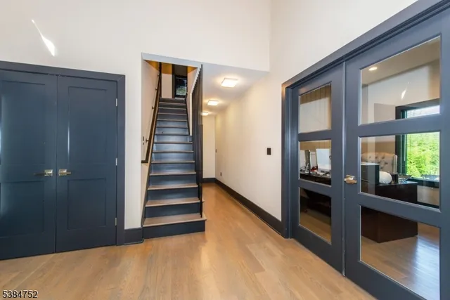 a view of a kitchen cabinets and entryway