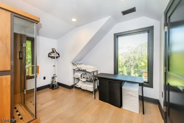 a view of a bedroom with a window