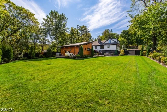 a view of a house with a big yard