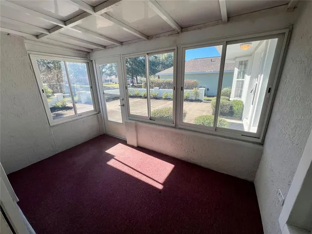 an entryway door with a hallway in a house