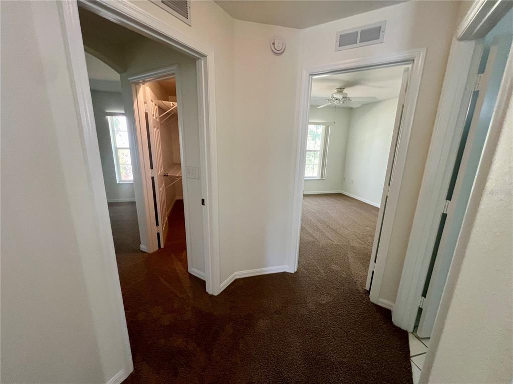 7205 Southwest 115th Place Ocala, FL 34476 - Photo 12 of 24 an entryway door with a hallway in a house