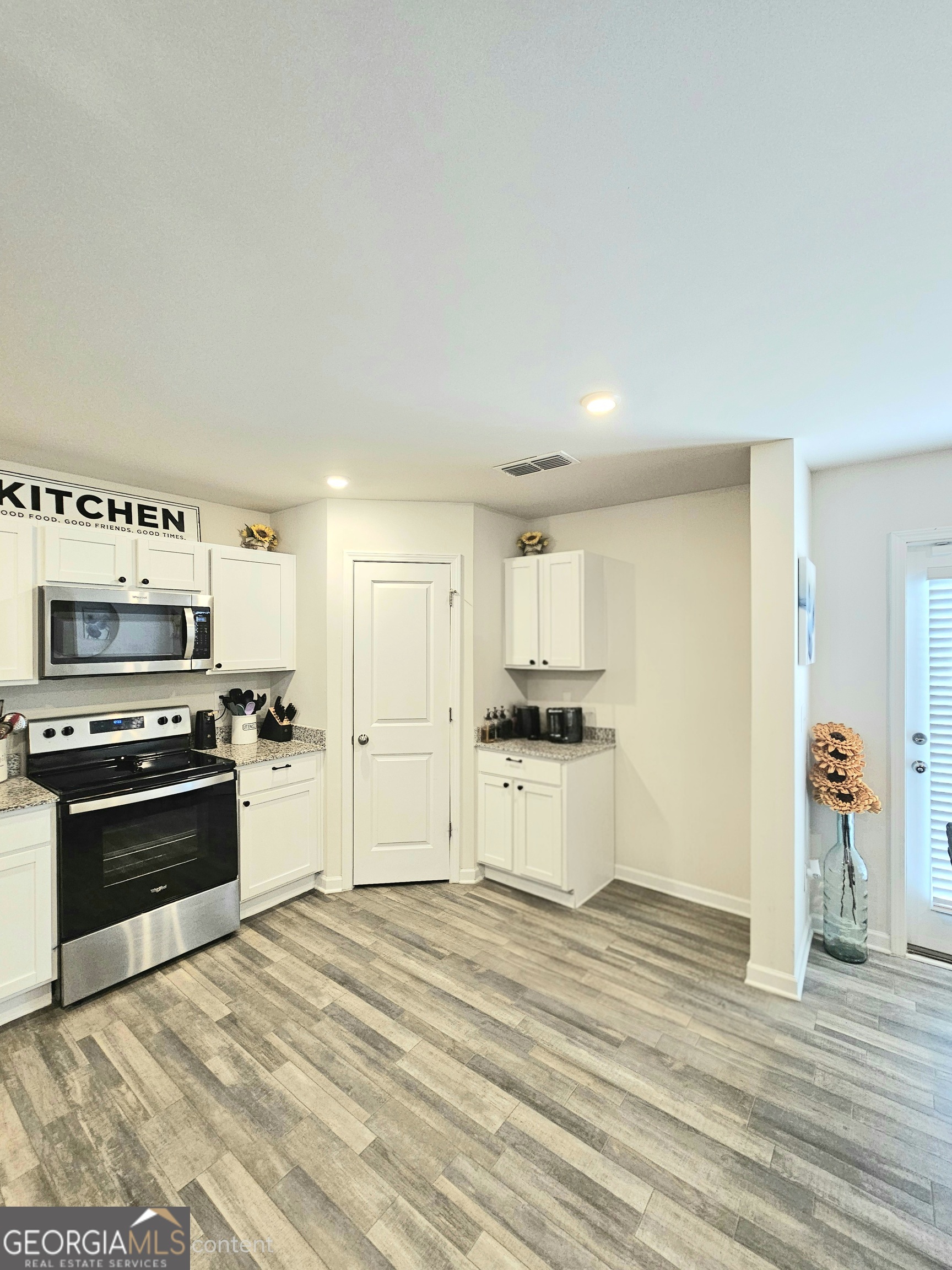 138 Catalpa Road Milner, GA 30257 - Photo 6 of 29 The fridge has been removed from this picture with AI because it is not a part of the sale.