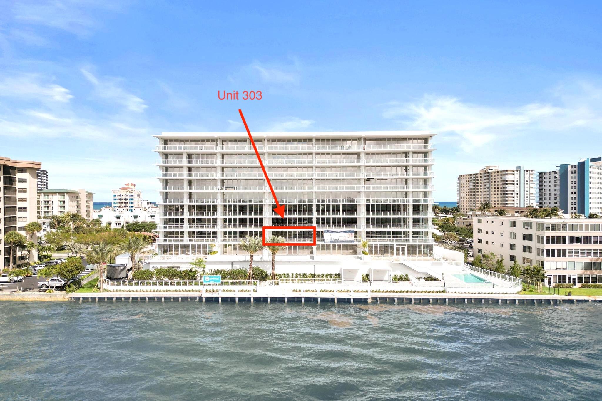 407 North Riverside Drive, Unit 303 Pompano Beach, FL 33062 - Photo 38 of 74 a view of a swimming pool with outdoor seating
