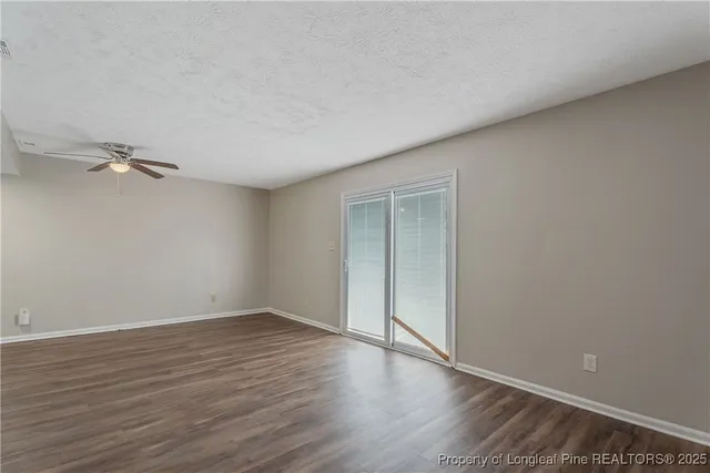a bathroom with a sink toilet and mirror