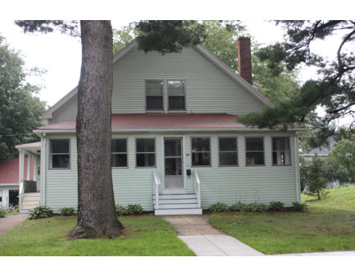 47 Concord Road Billerica, MA 01821 - Photo 1 of 21 a front view of a house with a garden
