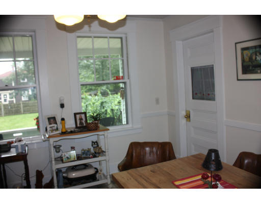 47 Concord Road Billerica, MA 01821 - Photo 11 of 21 a living room with furniture and a large window
