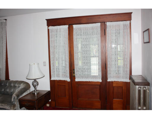 47 Concord Road Billerica, MA 01821 - Photo 4 of 21 a living room with furniture and a window