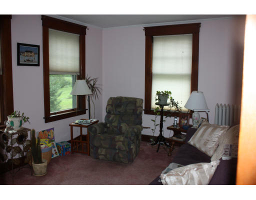47 Concord Road Billerica, MA 01821 - Photo 6 of 21 a living room with furniture and a window
