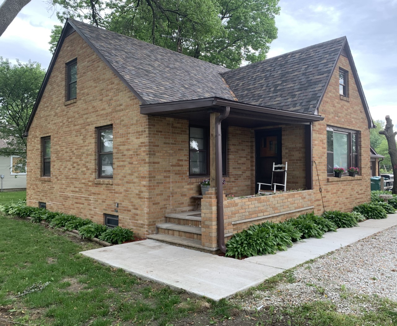 306 Maple Street Cedar Point, IL 61316 - Photo 1 of 43 a front view of a house with garden