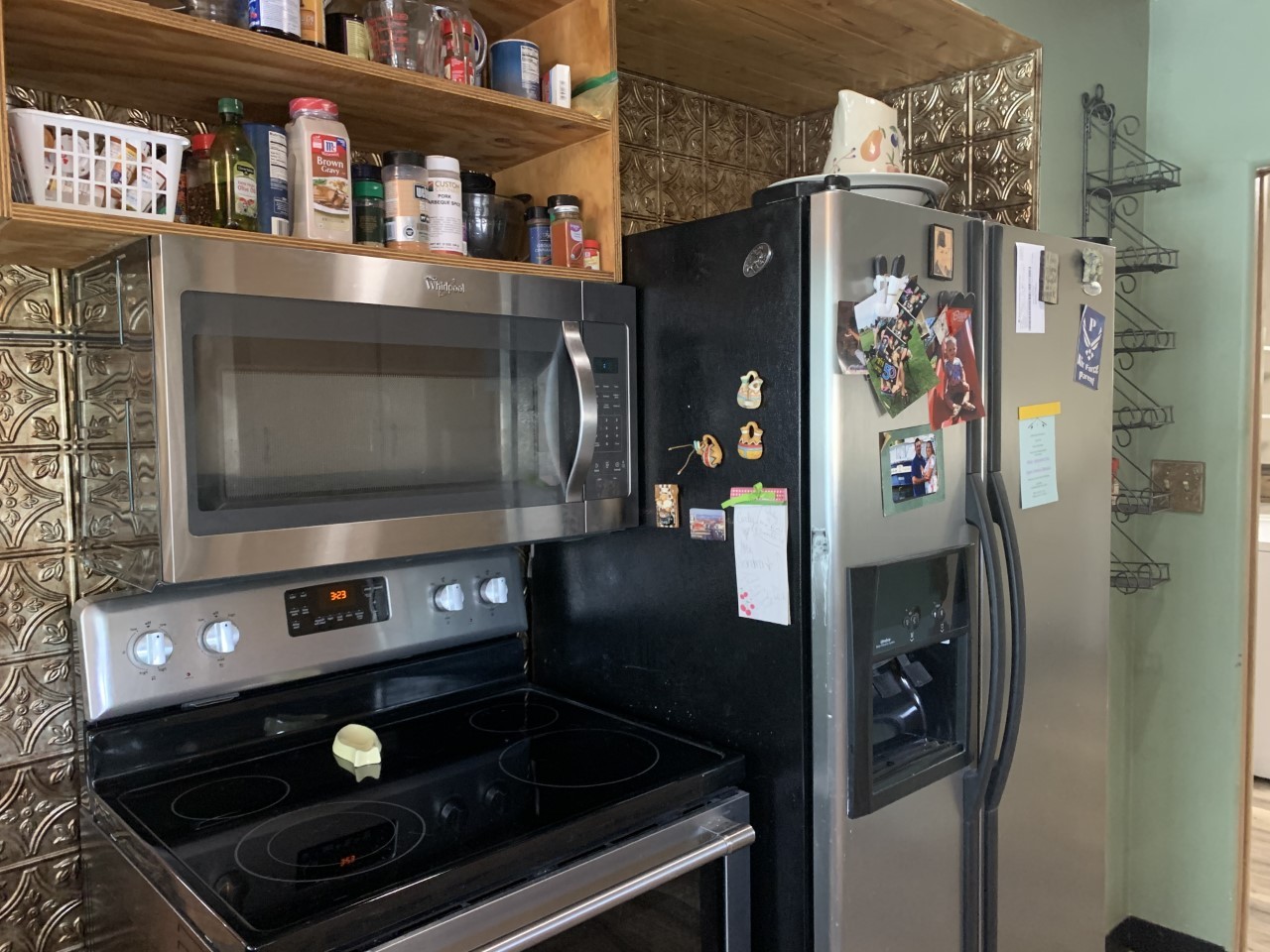306 Maple Street Cedar Point, IL 61316 - Photo 17 of 43 a kitchen with stainless steel appliances granite countertop a stove and a microwave