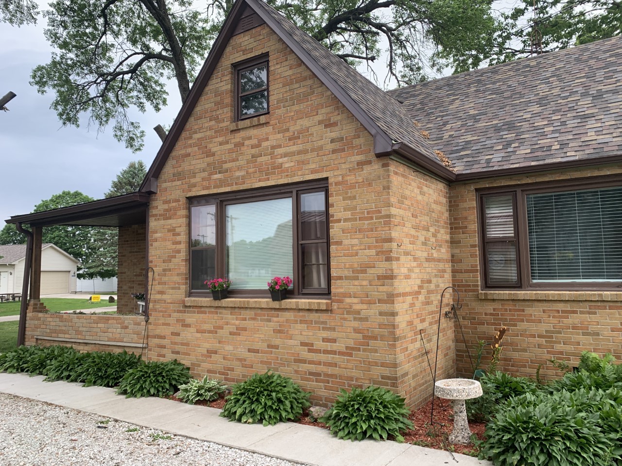 306 Maple Street Cedar Point, IL 61316 - Photo 3 of 43 a front view of a house with garden