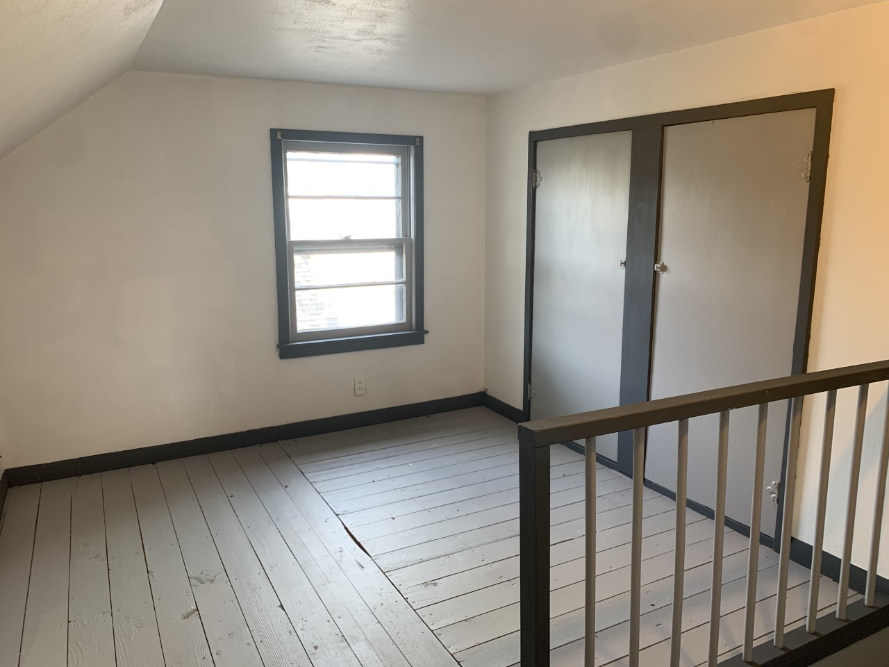 306 Maple Street Cedar Point, IL 61316 - Photo 28 of 43 a view of an empty room with wooden floor and a window