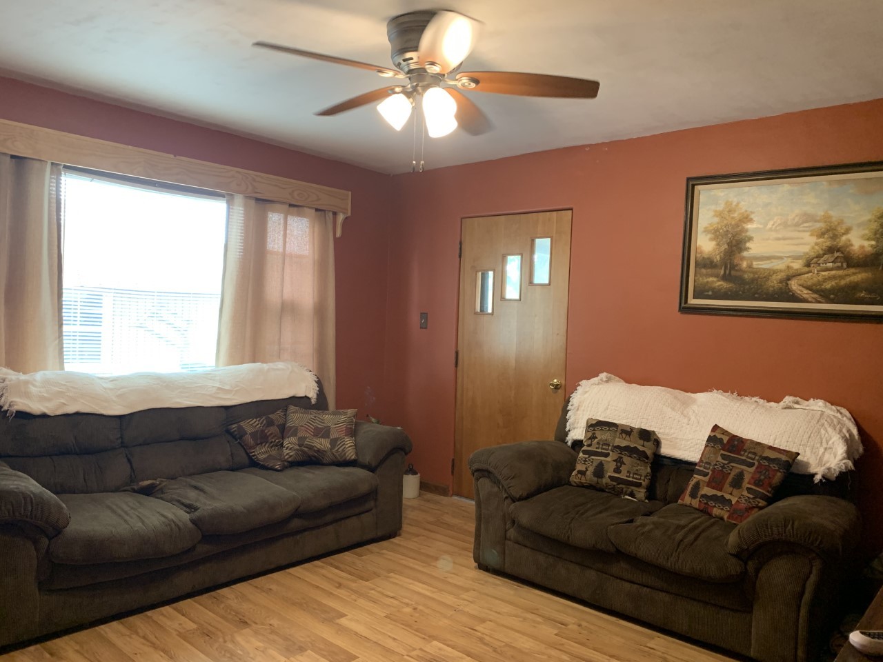 306 Maple Street Cedar Point, IL 61316 - Photo 7 of 43 a living room with furniture and a large window
