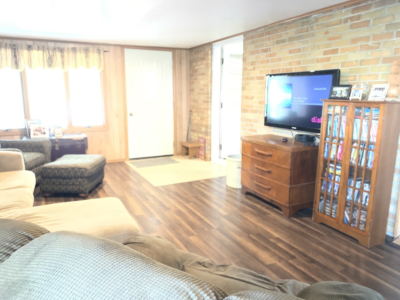 306 Maple Street Cedar Point, IL 61316 - Photo 8 of 43 a living room with furniture and a flat screen tv