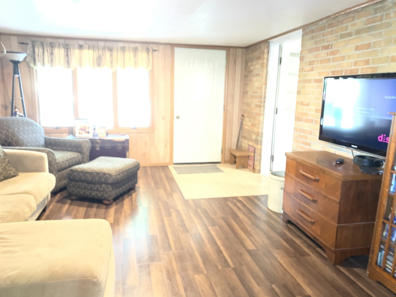 306 Maple Street Cedar Point, IL 61316 - Photo 9 of 43 a bedroom with furniture and a window