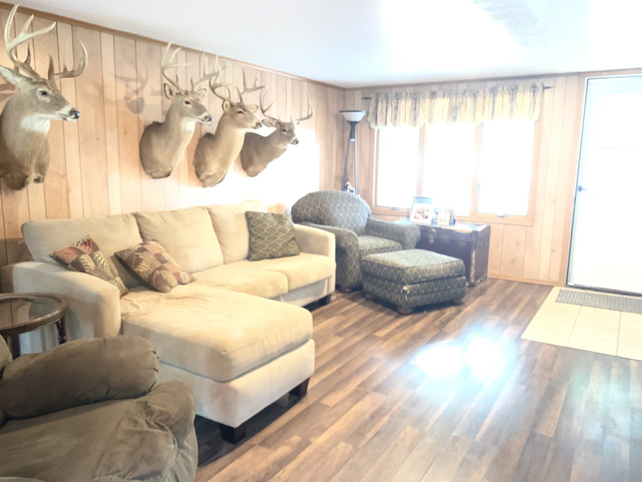 306 Maple Street Cedar Point, IL 61316 - Photo 10 of 43 a living room with furniture and a large window