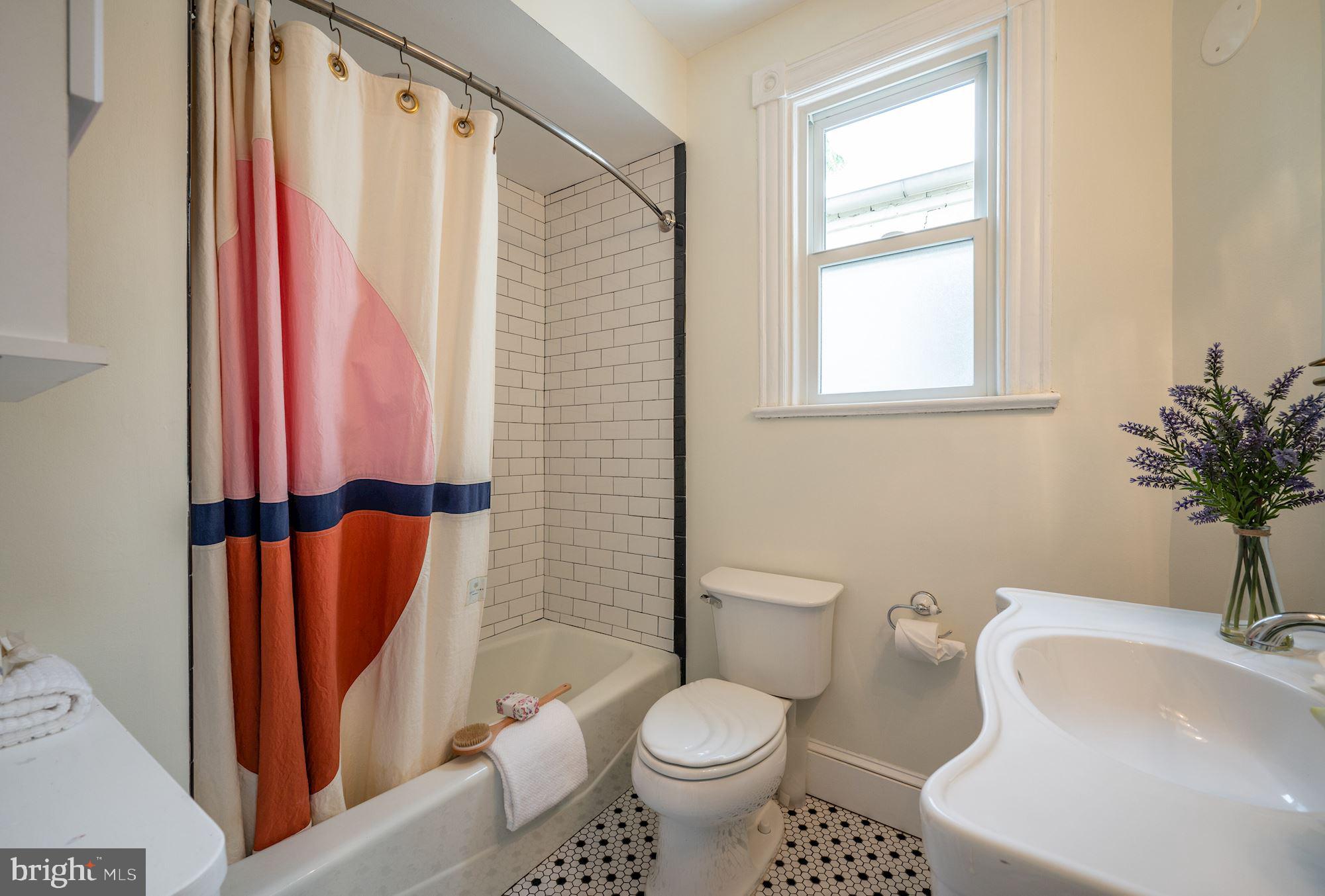 919 E Street Southeast Washington, DC 20003 - Photo 14 of 28 Updated hall bath on upper level