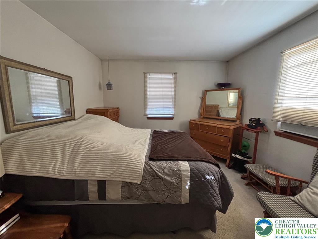 2547 Williams Road Bath, PA 18014 - Photo 8 of 18 a bedroom with a bed and wooden floor