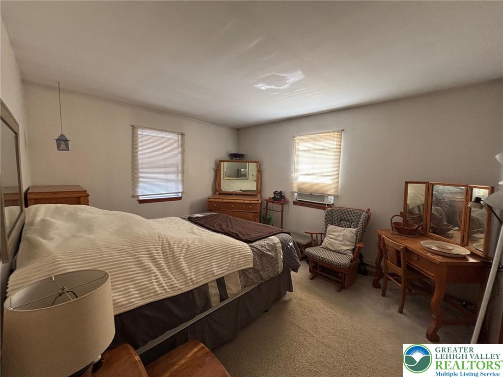 2547 Williams Road Bath, PA 18014 - Photo 9 of 18 a bedroom with a bed and wooden floor