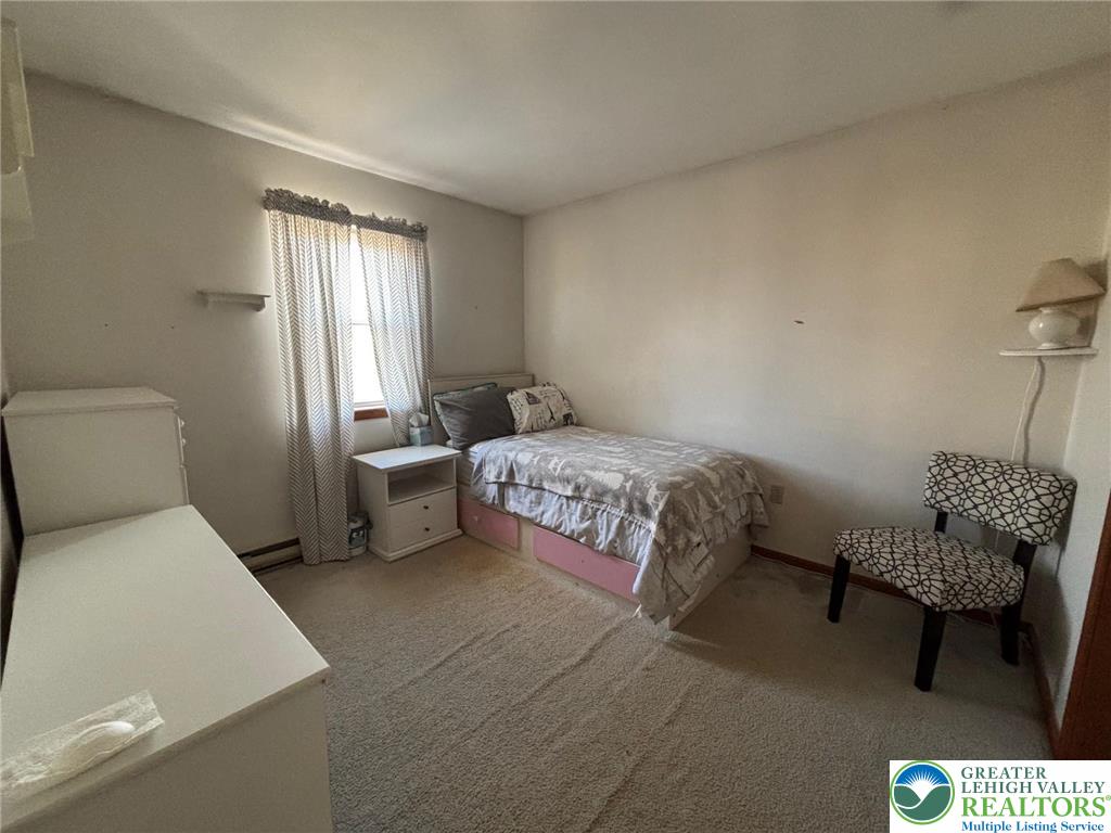 2547 Williams Road Bath, PA 18014 - Photo 10 of 18 a bedroom with a bed and a couch