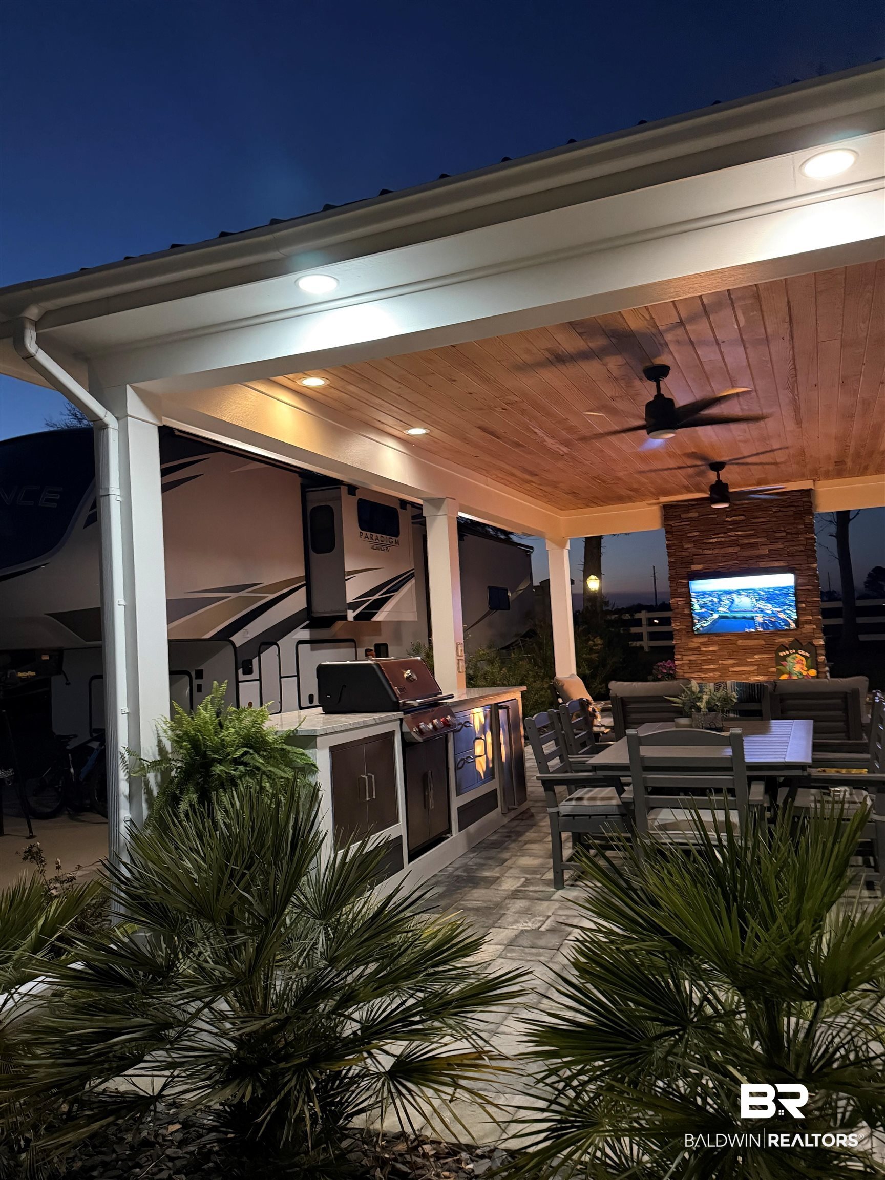 12377 Gateway Drive Elberta, AL 36530 - Photo 27 of 64 View of patio / terrace with ceiling fan and an outdoor kitchen / dining area