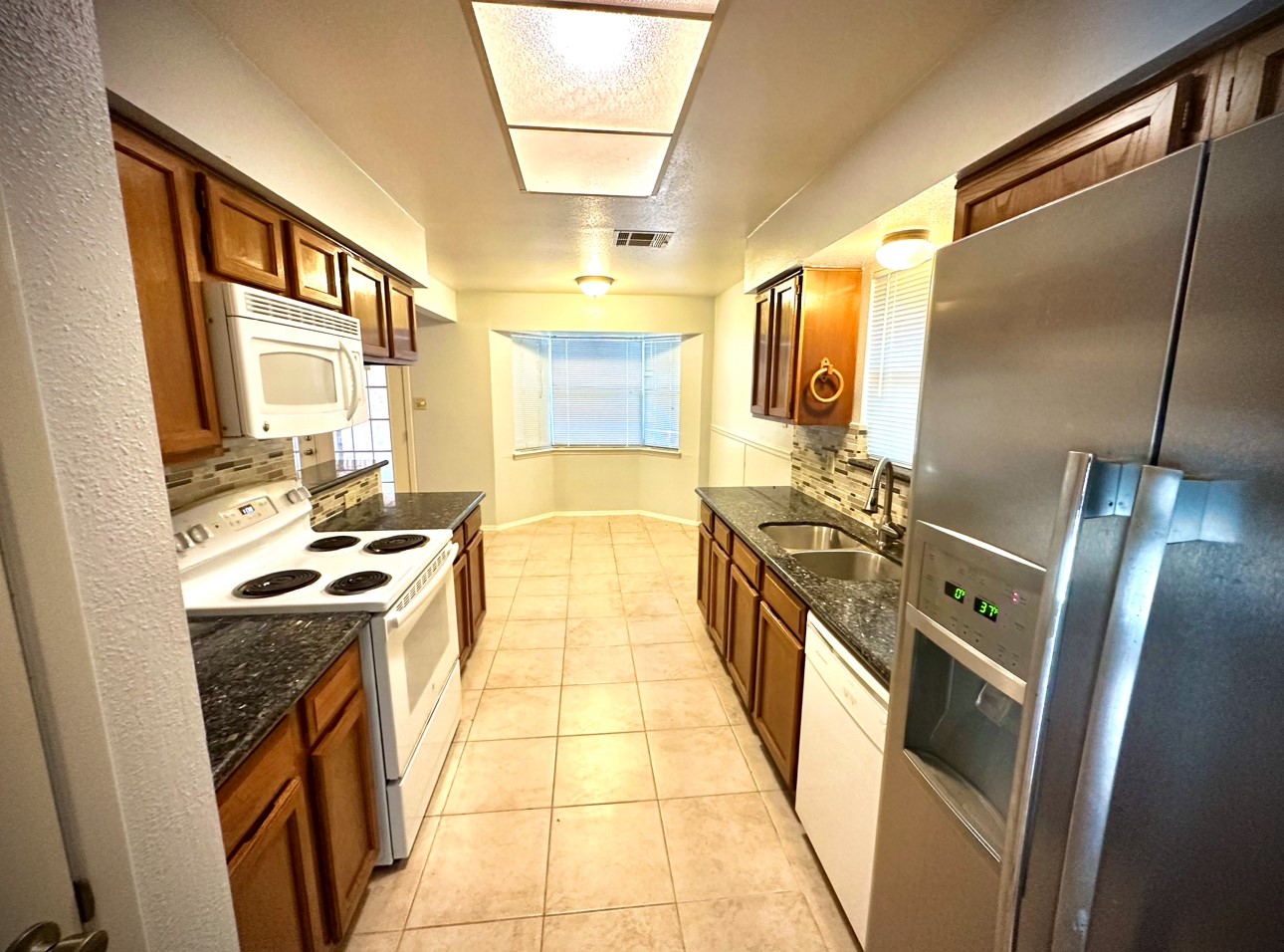 18 Brookflower Road The Woodlands, TX 77380 - Photo 9 of 23 Stainless Steel Appliances Included