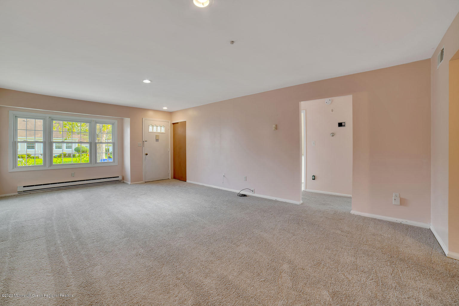 136 Rigi Strasse, Unit 1000 Freehold, NJ 07728 - Photo 3 of 25 a view of an empty room with a window