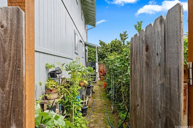 a view of a garden with pathway