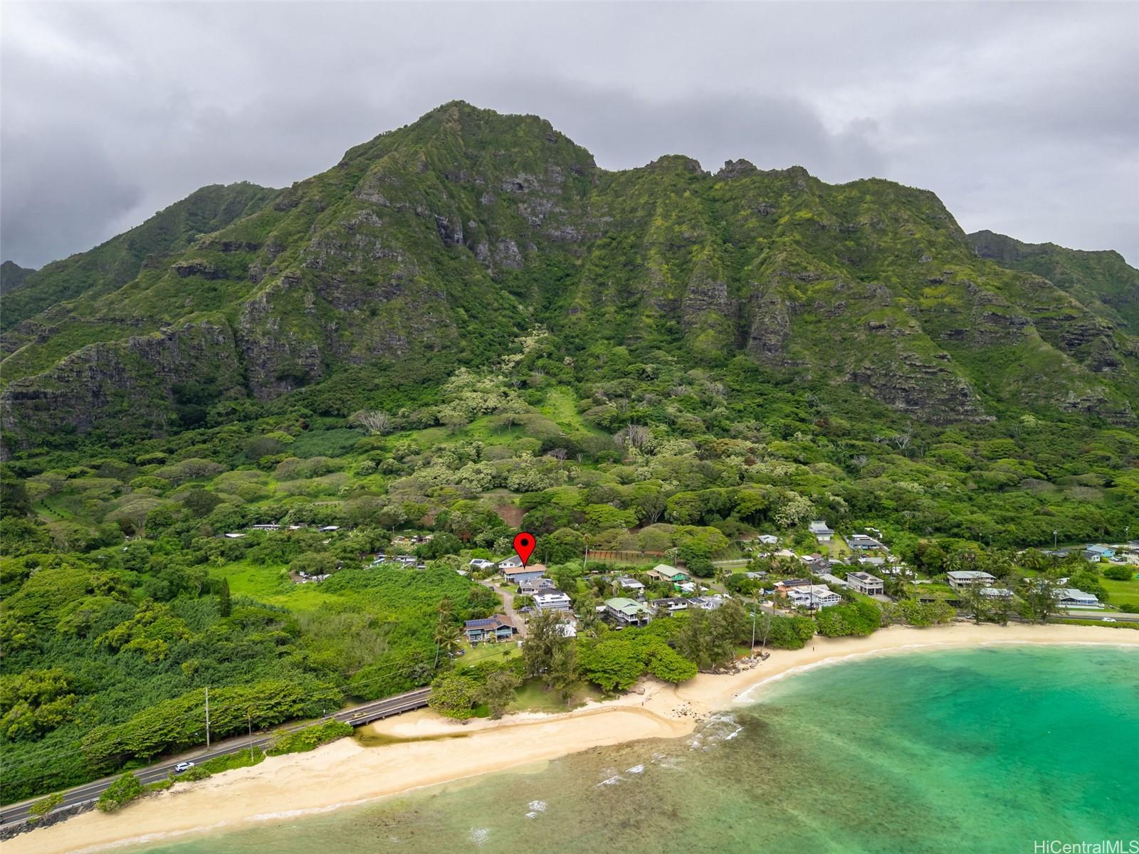 51-17 Kaʻaʻawa Place Kaaawa, HI 96730 - Photo 5 of 25 a view of a lush green field with mountains in the background