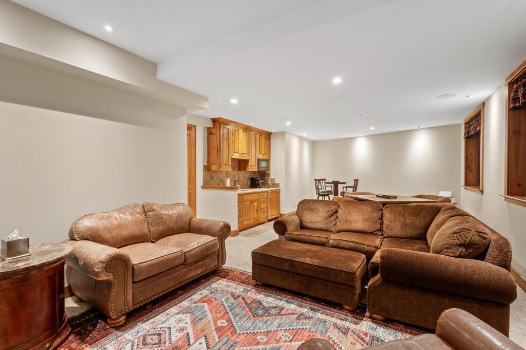 210 South Sunset Ridge Drive Telluride, CO 81435 - Photo 10 of 18 a living room with furniture kitchen view and a couch