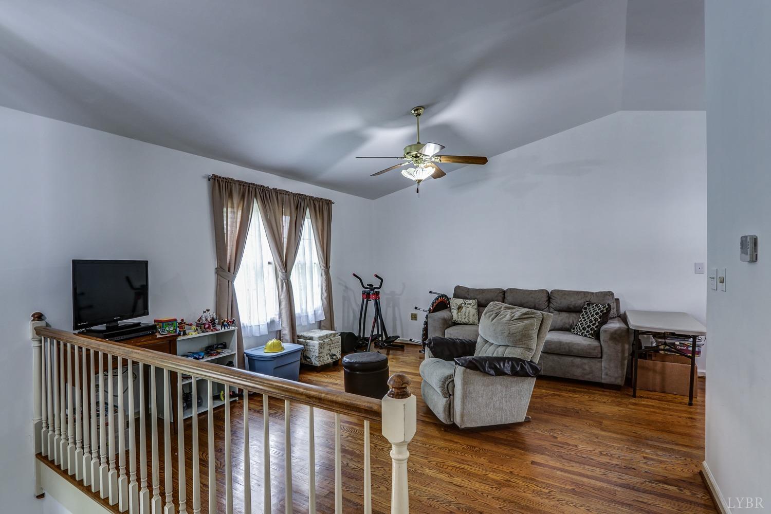 127 Southern Lane Monroe, VA 24574 - Photo 14 of 44 a living room with furniture and wooden floor